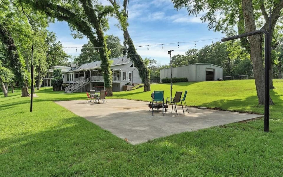This beautiful property includes a private waterfront yard perfect for your next vacation with plenty of room for a large gathering and dancing under the stars.
