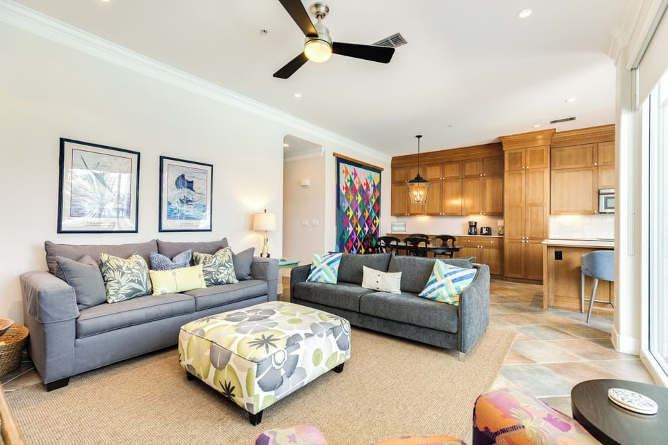 Enjoy great views of the pool and beach from the comfortable couches