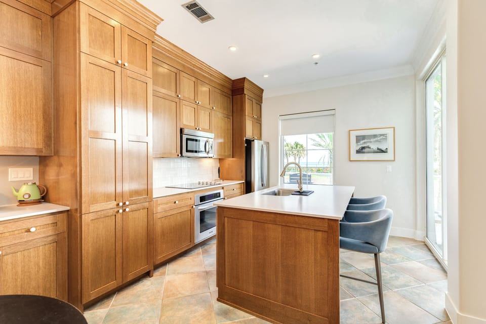 Grab a quick bite or watch the family chef from the breakfast bar seating 2