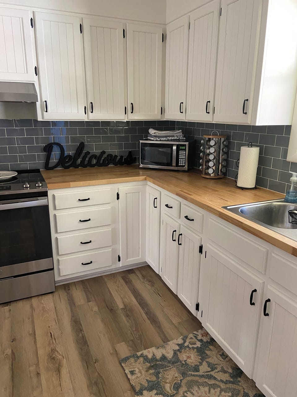 Kitchen is fully stocked with dishes and pots/pans.  Ample counter space!