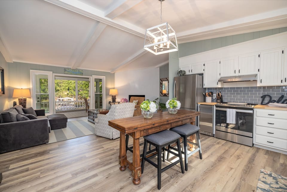 Updated kitchen and living room with gorgeous views of the lake