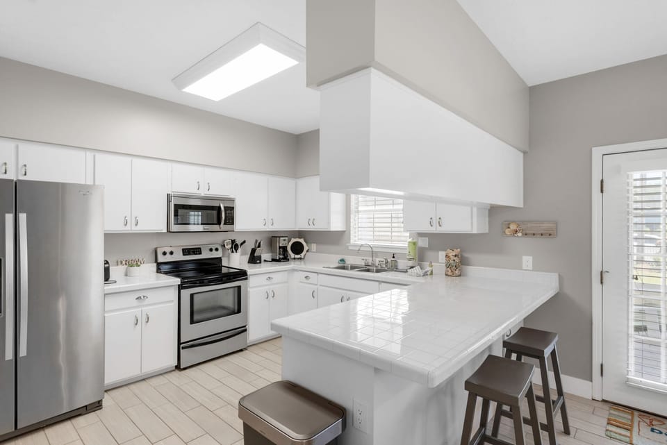 Kitchen with eat-in bar seating