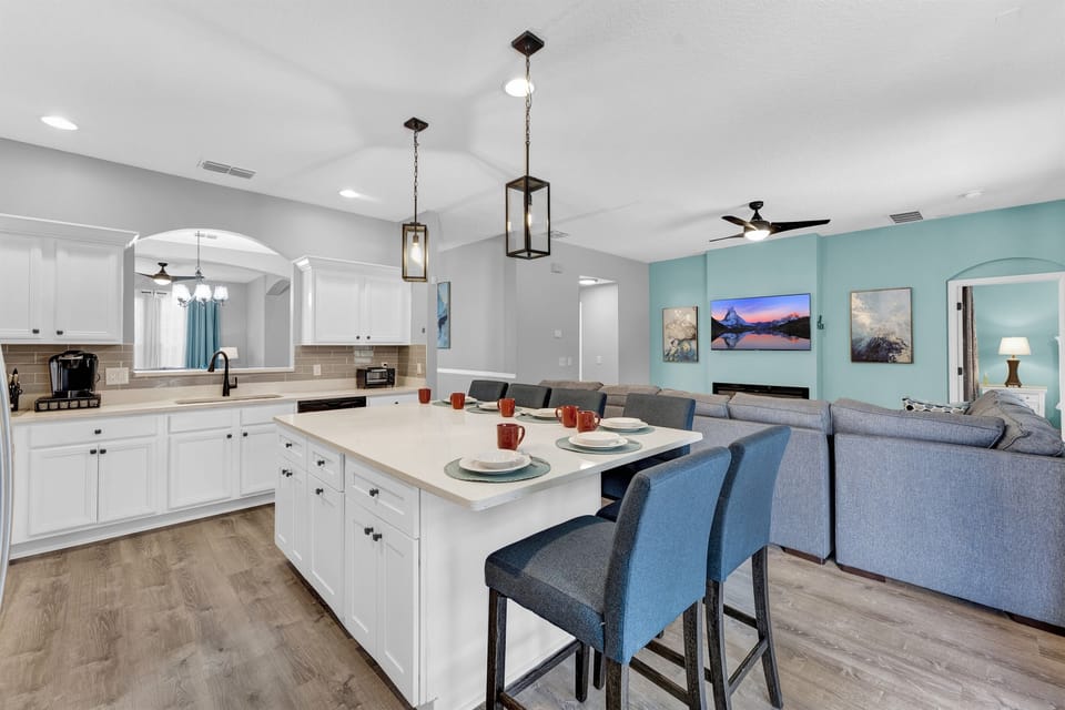 •	"Culinary dreams come true in our fully stocked, open kitchen. From breakfast bar chats to gourmet dinners, this space is designed for connection and convenience, all in one elegant setting." •	"Gather, cook, and celebrate in a kitchen designed for the w