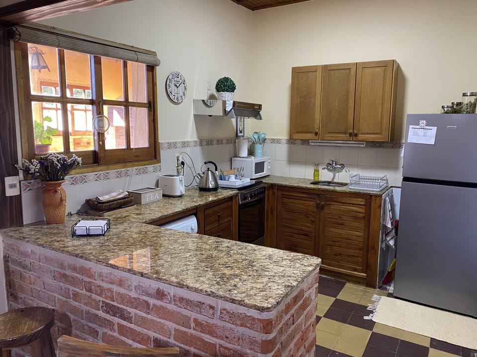 Comfort House, 3 Bedrooms, Non Smoking, Garden View | Private kitchen | Full-size fridge, microwave, oven, stovetop