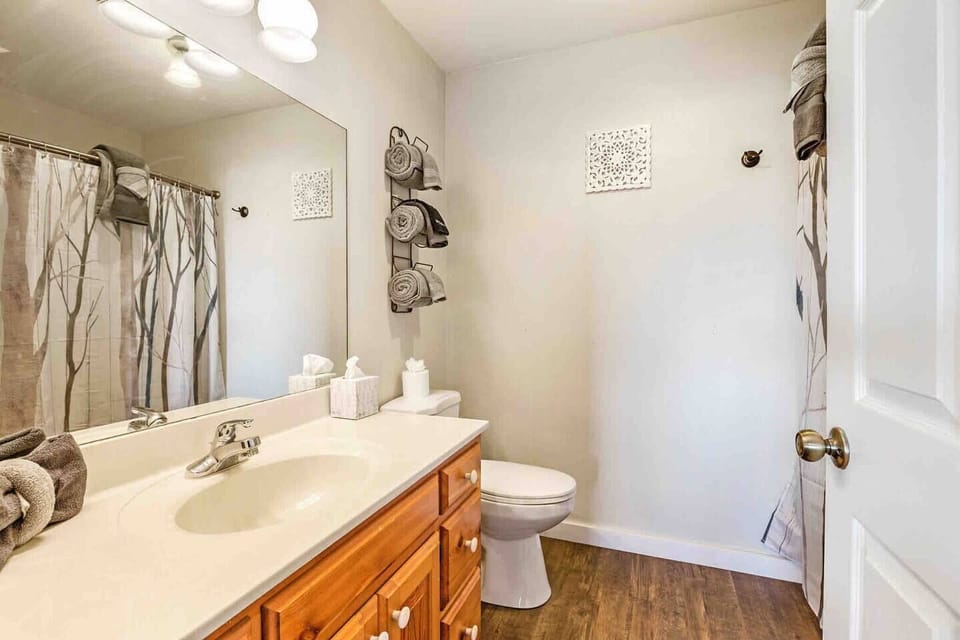 Full bathroom with lower kind bedroom