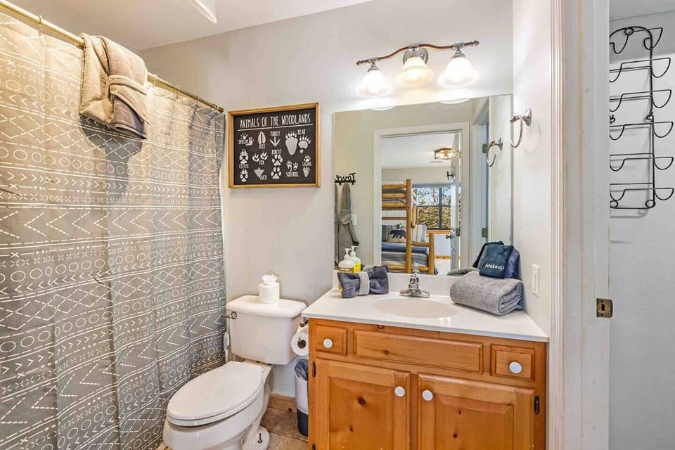 Full bathroom connected with the bunk bedroom