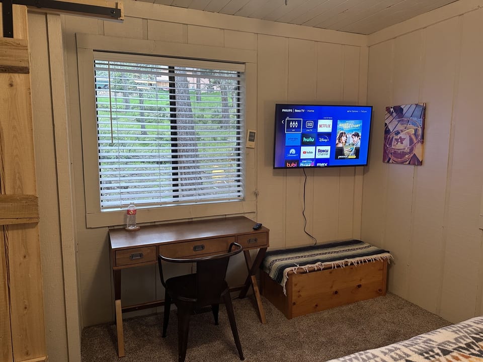 1st bedroom with king bed, smart tv, dedicated workspace (high speed fiber included)
