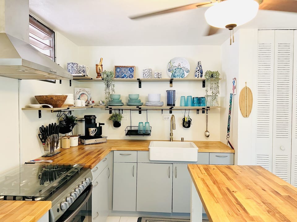 Full kitchen, coffee bar, coffee, sugar, cups, plates, everything you need 