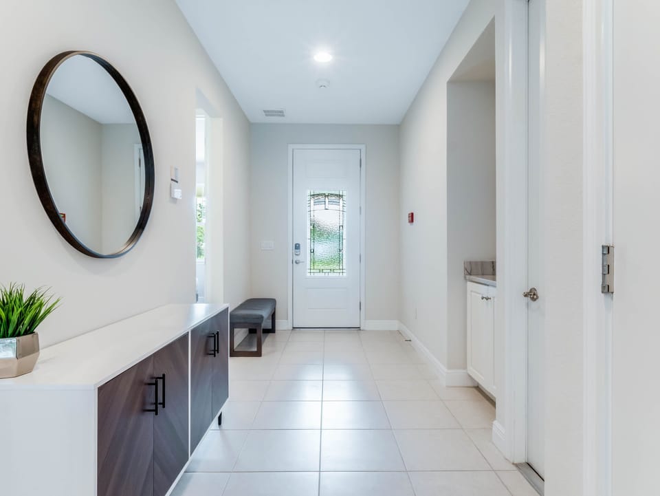 - Modern entryway with stylish console mirror and bright natural light  
- Orlando vacation rental near Disney with welcoming home design  
- Perfect family stay offering comfort from the moment you arrive