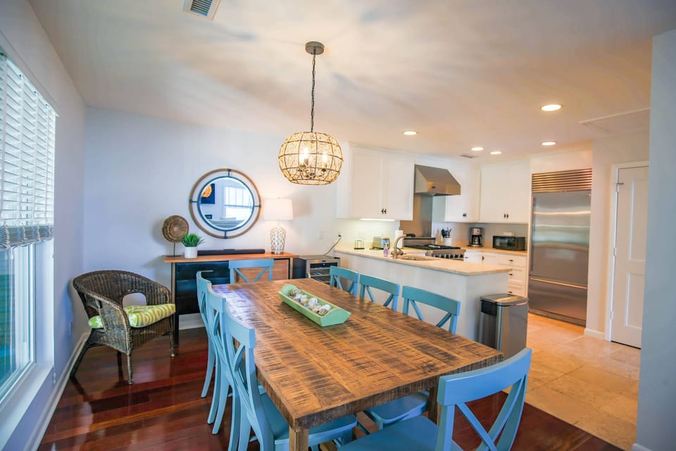 The dining room opens onto both the kitchen and the living room areas.