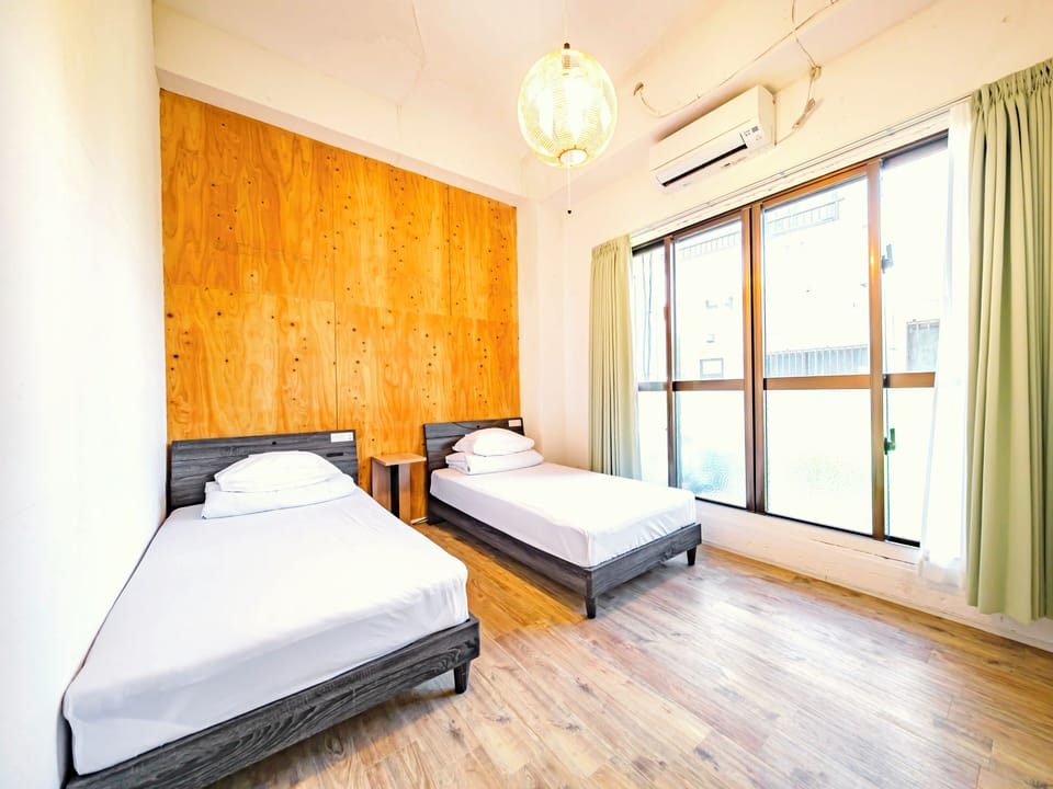 Twin Room, 2 Twin Beds, Non Smoking | Down comforters, minibar, blackout drapes, soundproofing