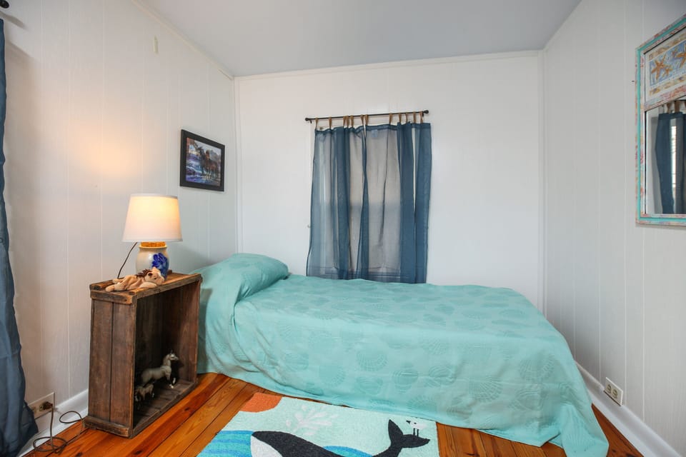 Colors of Sea Glass with fun Pony Accents are throughout the upstairs Bedrooms.