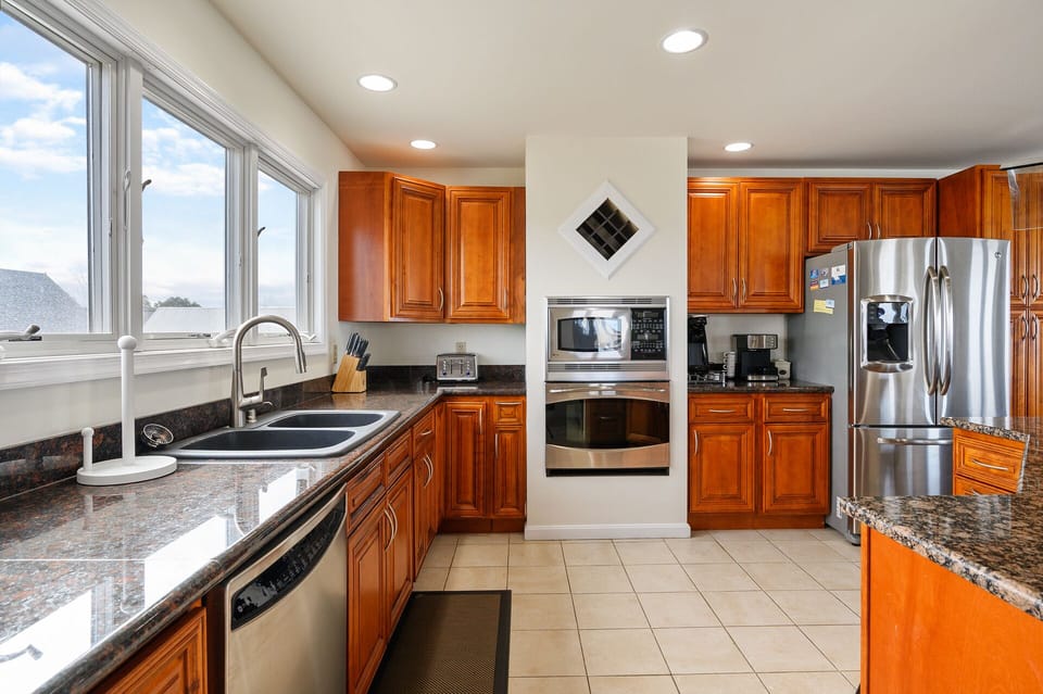 Stainless Appliances and Custom Tile.