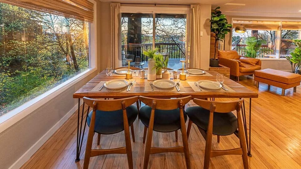 Family dining area with slide out door to upper deck