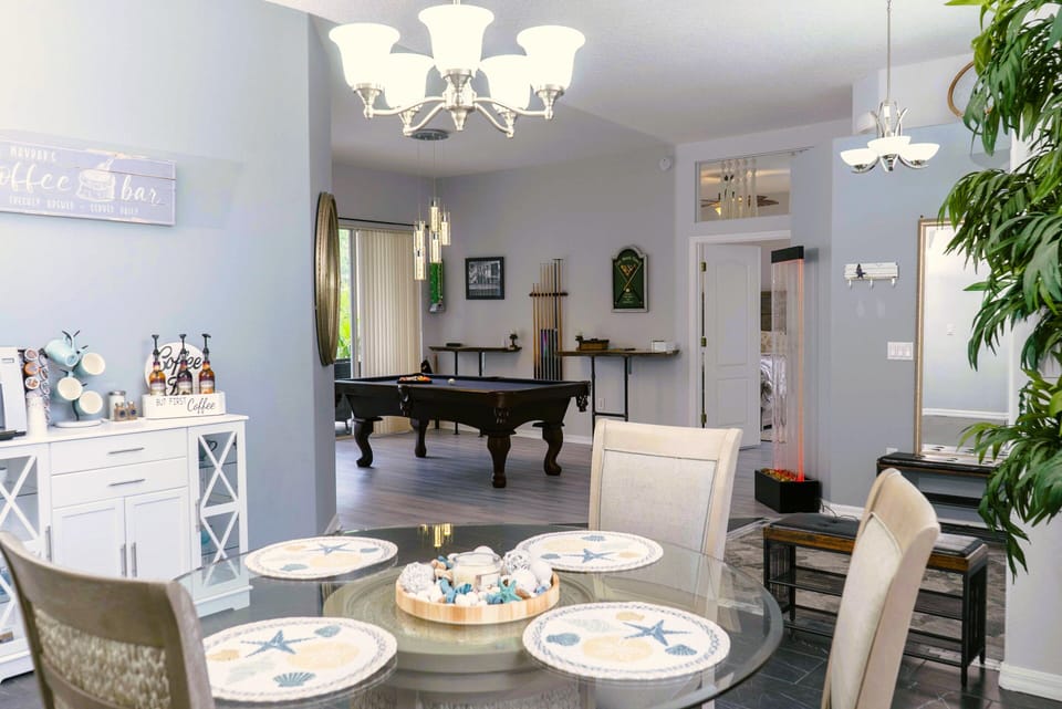 Breakfast nook opens to pool table room