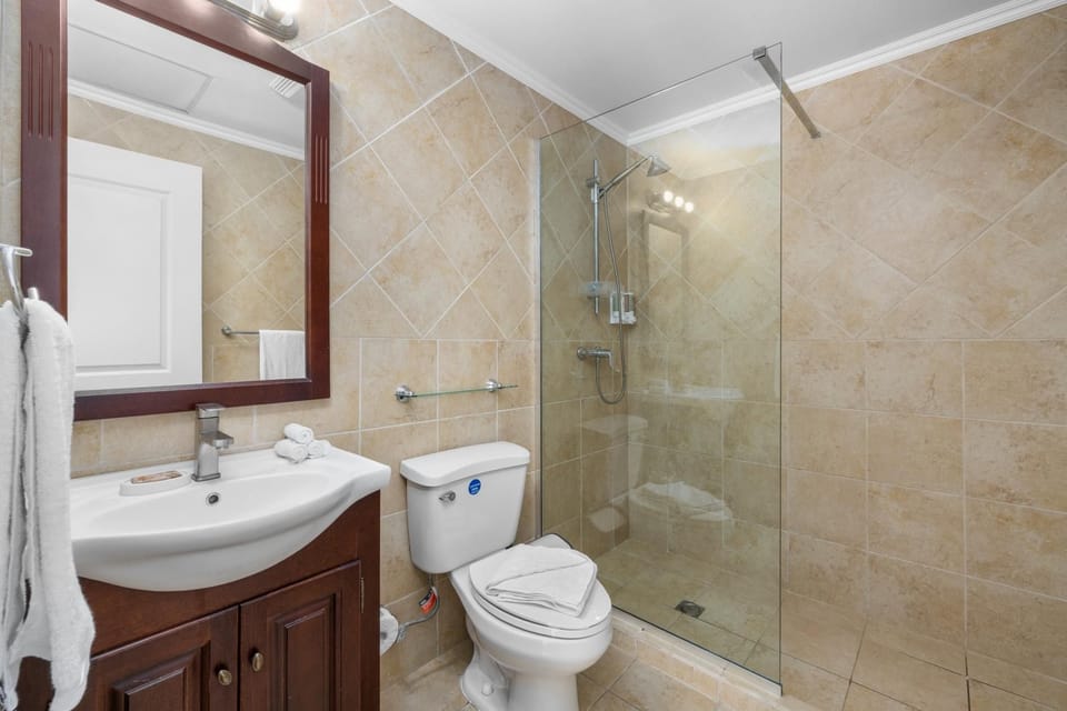 Modern comfort meets elegance in our beautifully appointed bathroom retreat.