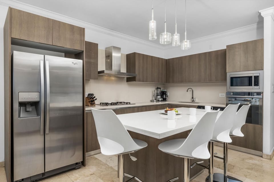 Modern and sleek living/dining/kitchen area.