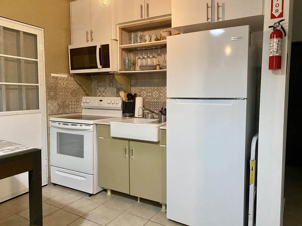 Our modern kitchen comes fully stocked with everything you need