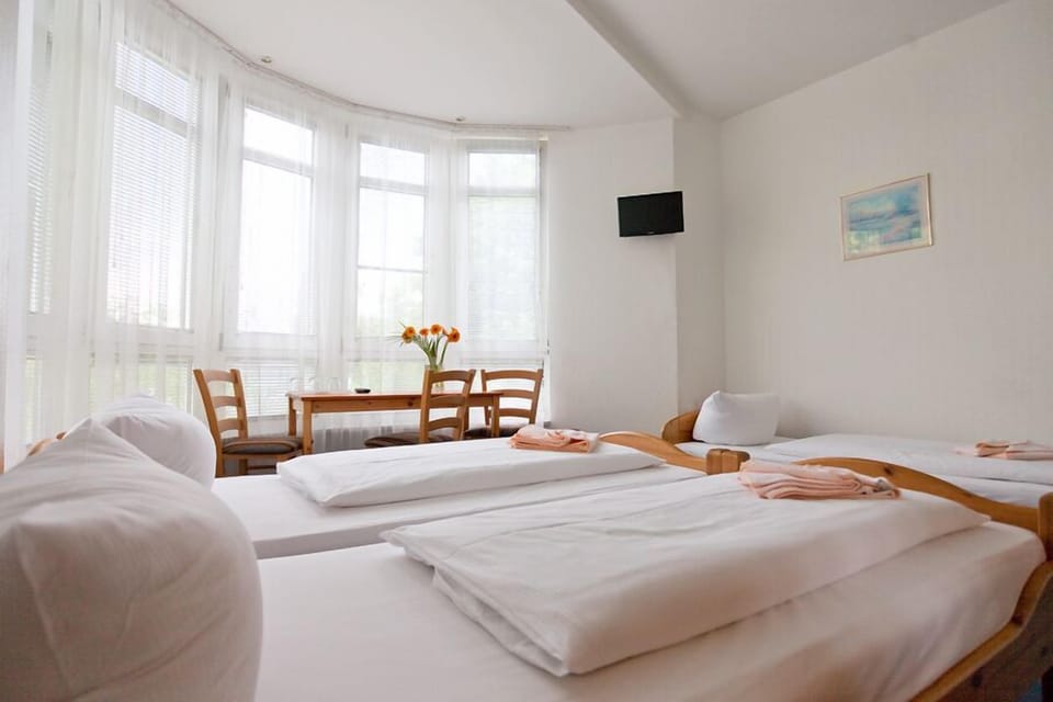Family Room | Hypo-allergenic bedding, desk, blackout drapes, soundproofing