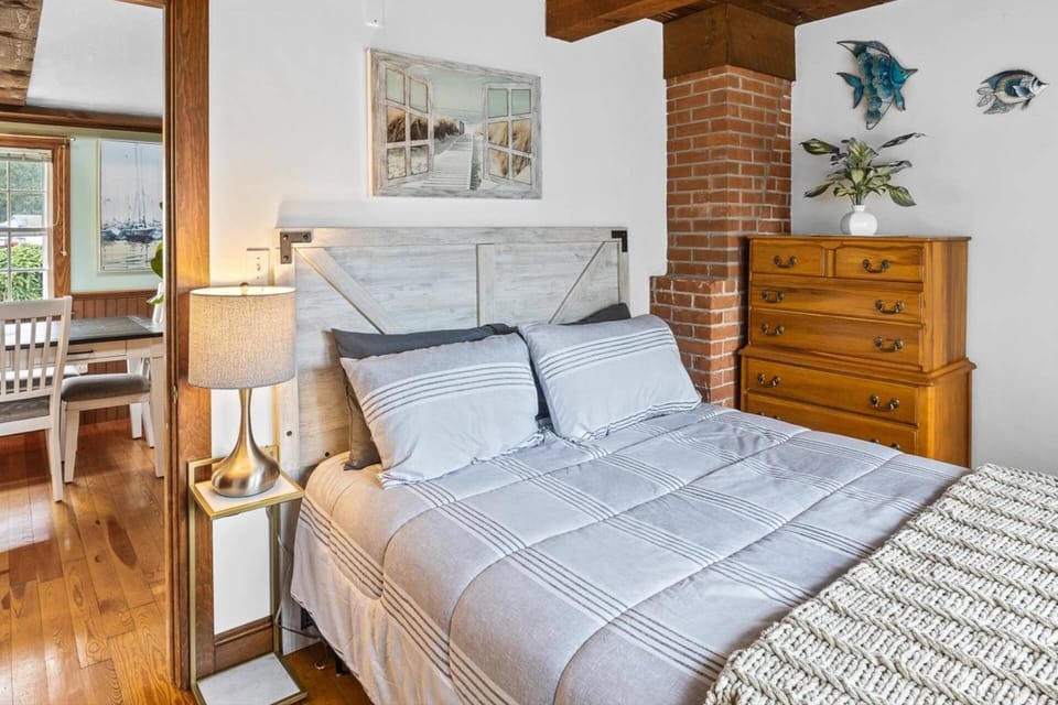 Another view of one of the queen bedrooms with a closet