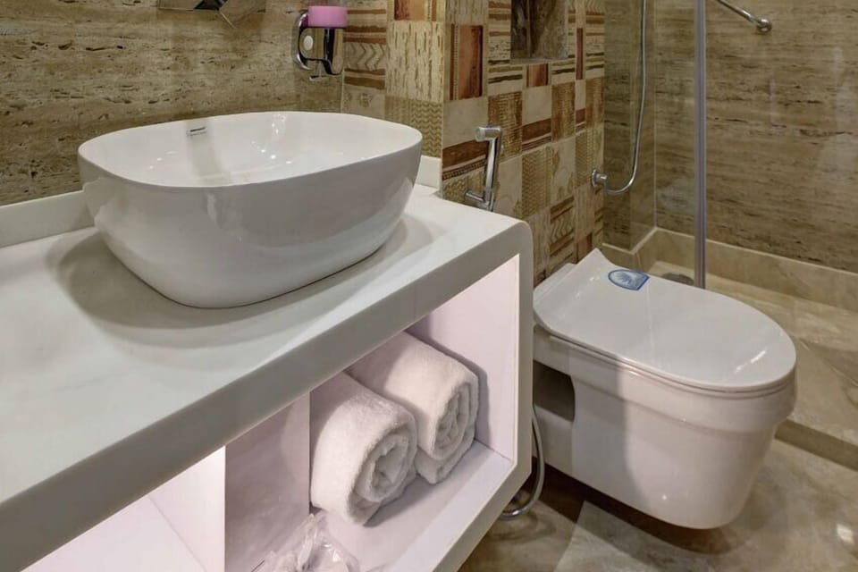 Shower, free toiletries, hair dryer, bathrobes
