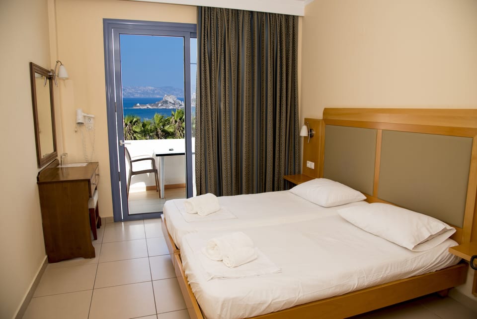 Double or Twin Room, Sea View | Desk, travel crib, free WiFi, bed sheets
