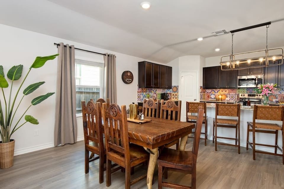 The table legs are made out of real Texas Longhorns. Seating for 10. 