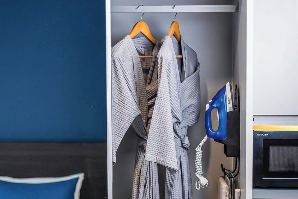 Shower, hydromassage showerhead, hair dryer, bathrobes