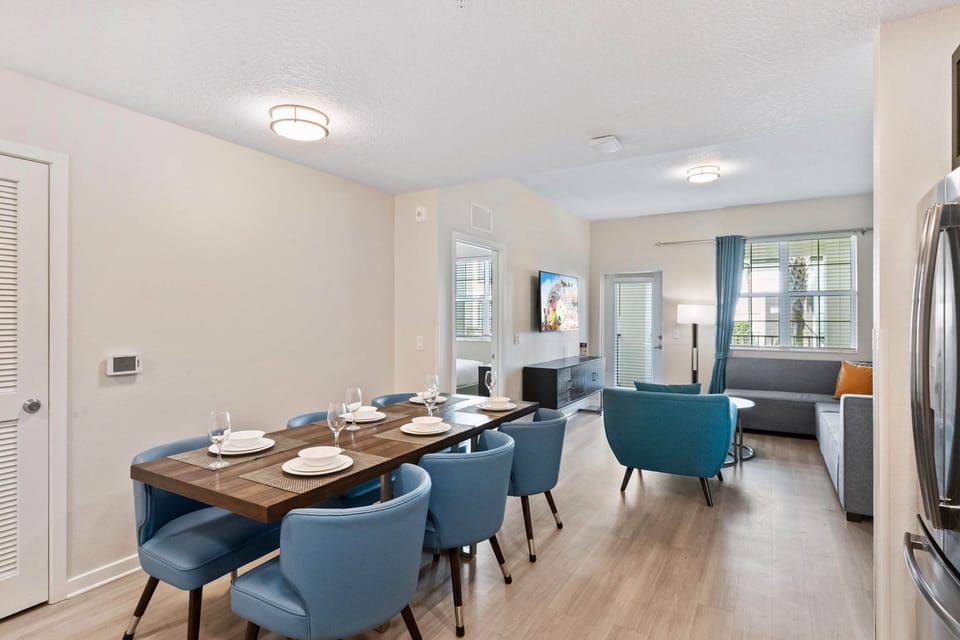 Stylish Feast: Our dining area in the townhouse is a feast for the eyes, where tasteful decor and a welcoming ambiance set the perfect scene for memorable meals