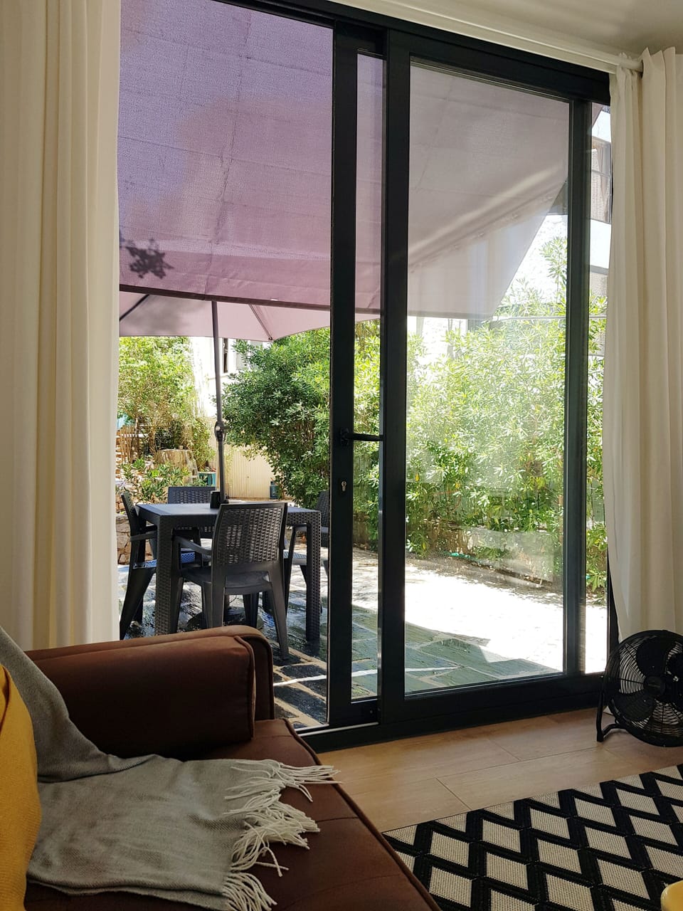 Shade in front of the living room for the hot summer days