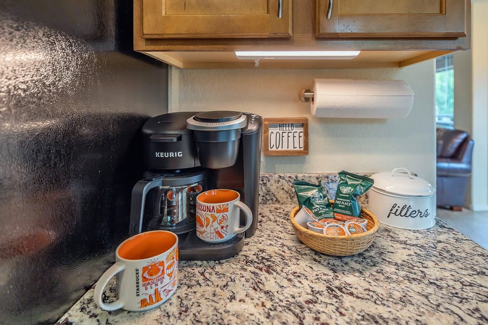 Start your day with a fresh cup of coffee in our fully equipped kitchen. Enjoy your morning brew while taking in the stunning views.