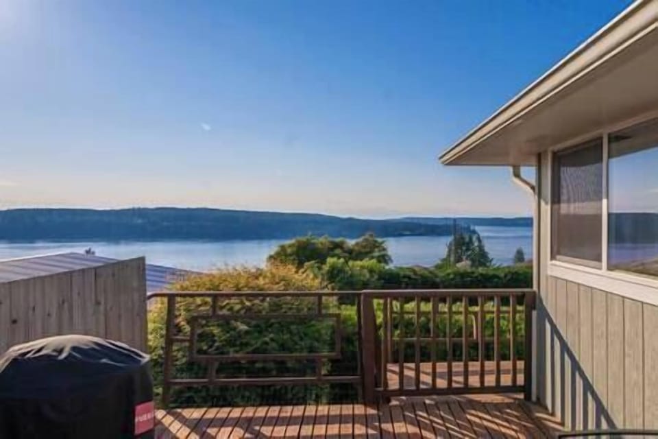 Easily step out from the kitchen to the deck with BBQ and views!