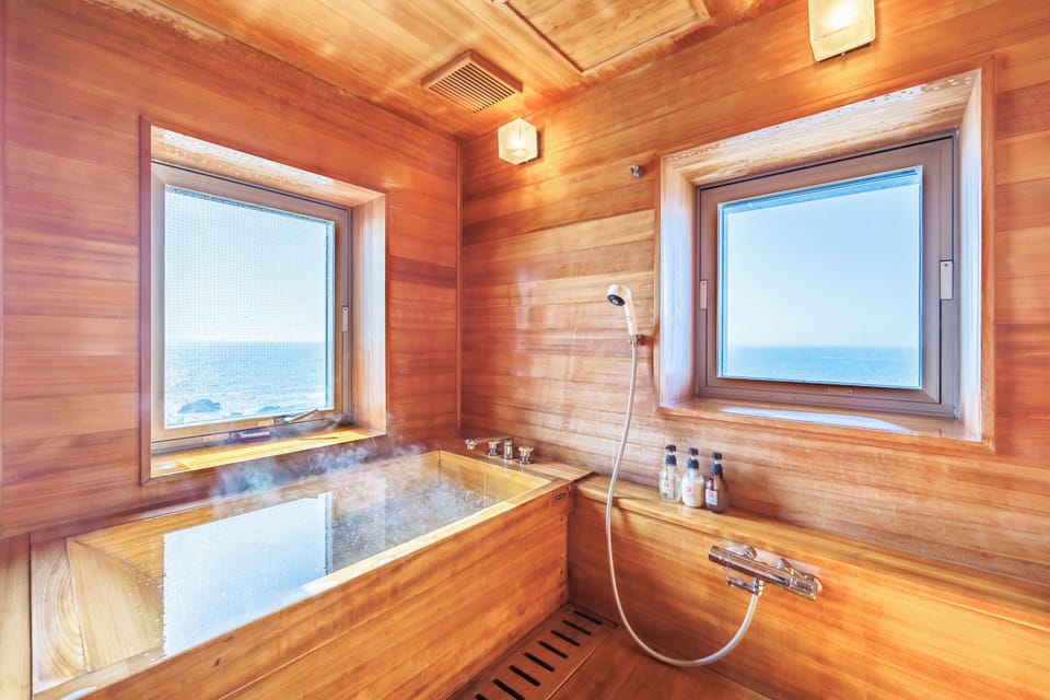Bathtub, eco-friendly toiletries, hair dryer, slippers