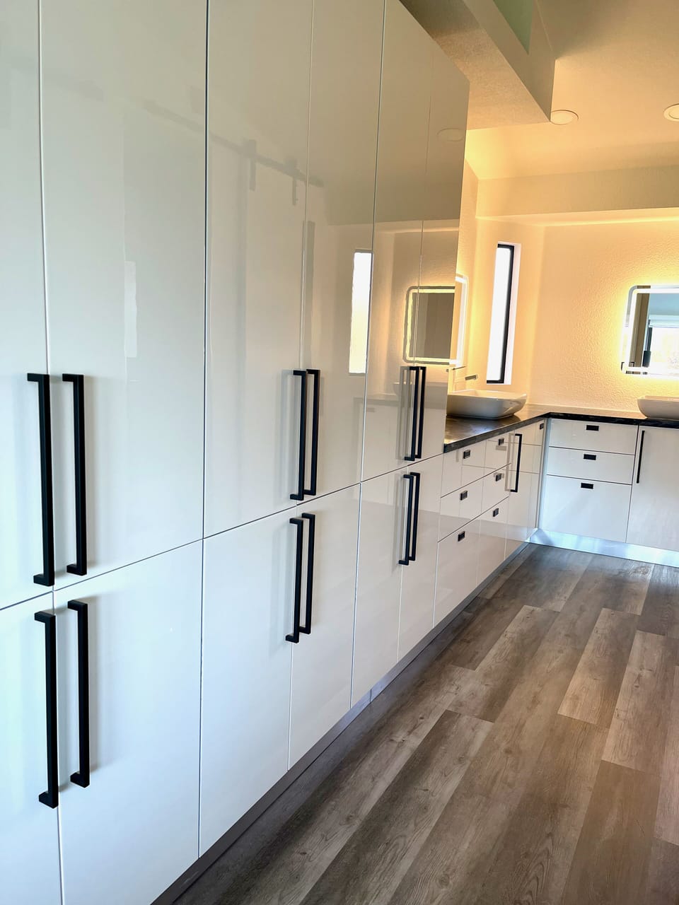 Lots of cabinets in the master bedroom hallway.