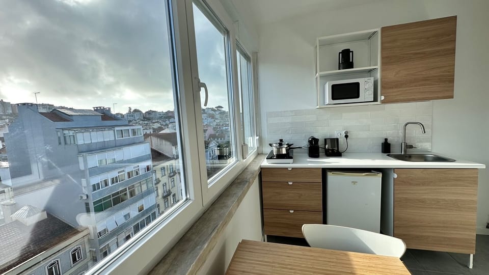 City Triple Room, Shared Bathroom | Private kitchen | Mini-fridge, microwave, stovetop, coffee/tea maker