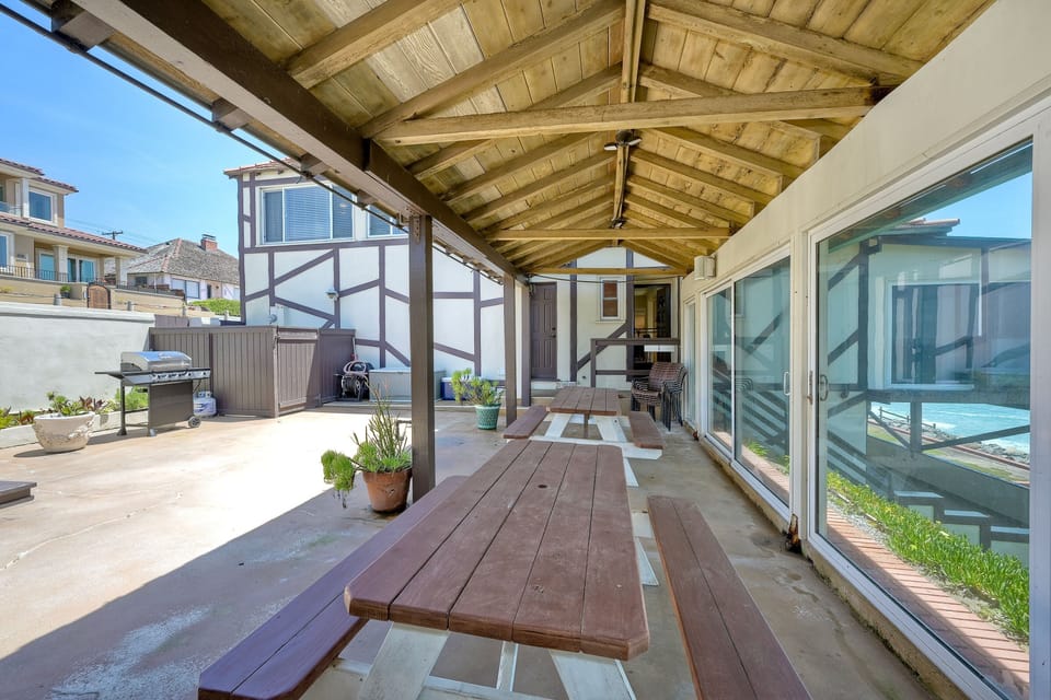 Gas BBQ grill on patio for outdoor cooking