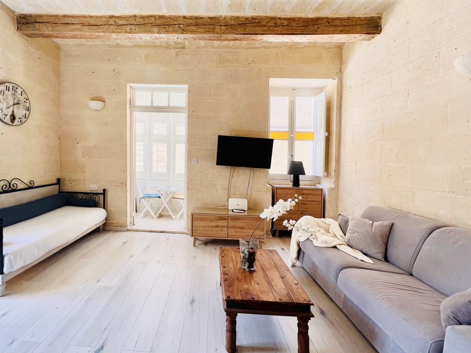 Luxury Apartment | Living area | 70-cm Smart TV with digital channels, TV, streaming services