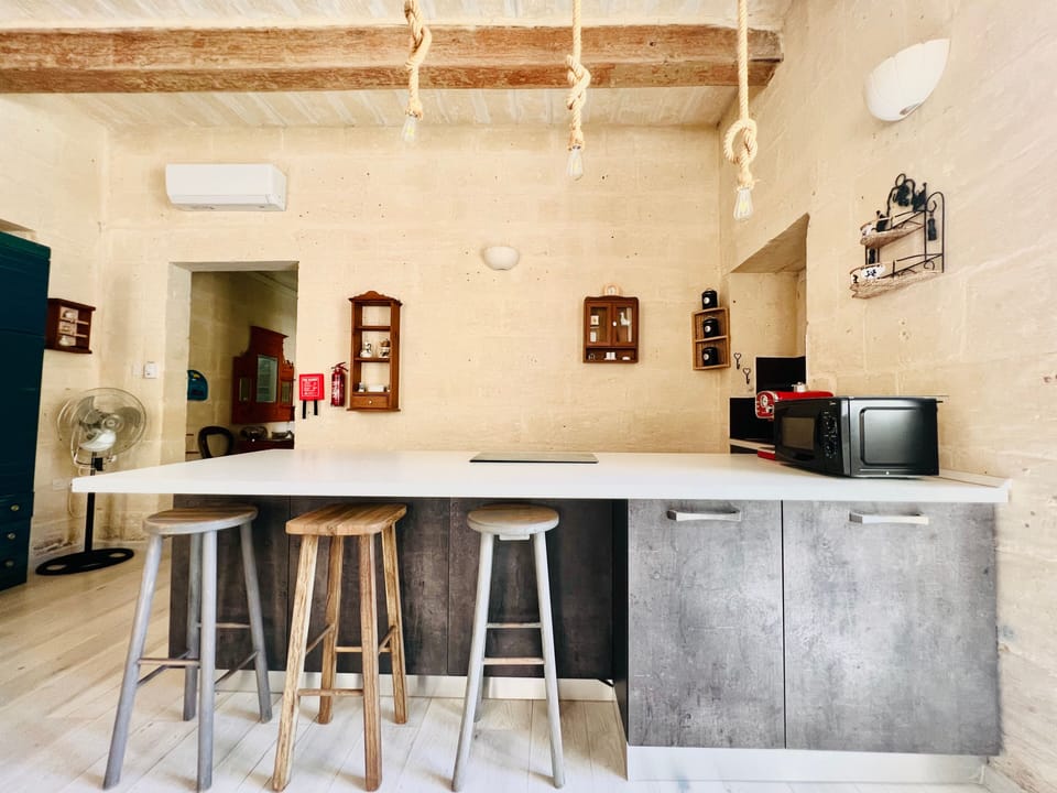 Luxury Apartment | Private kitchen | Mini-fridge, microwave, stovetop, coffee/tea maker