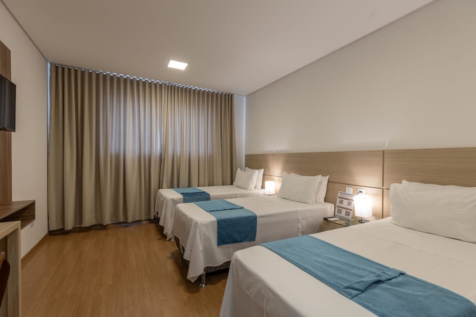 Deluxe Triple Room | Minibar, soundproofing, free WiFi, bed sheets