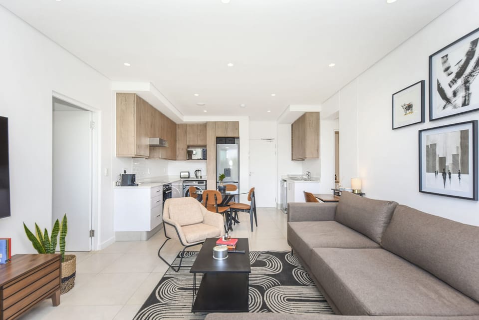 Comfort Apartment | Living area | 50-inch flat-screen TV with cable channels, TV, Netflix