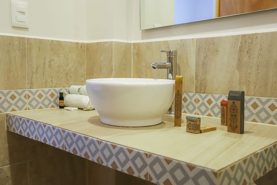 Shower, rainfall showerhead, designer toiletries, towels