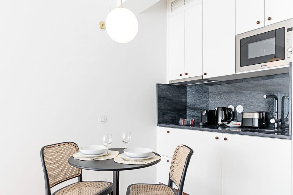 Practical kitchenette equipped with all the appliances required for your basic needs, during your stay #modern #charming