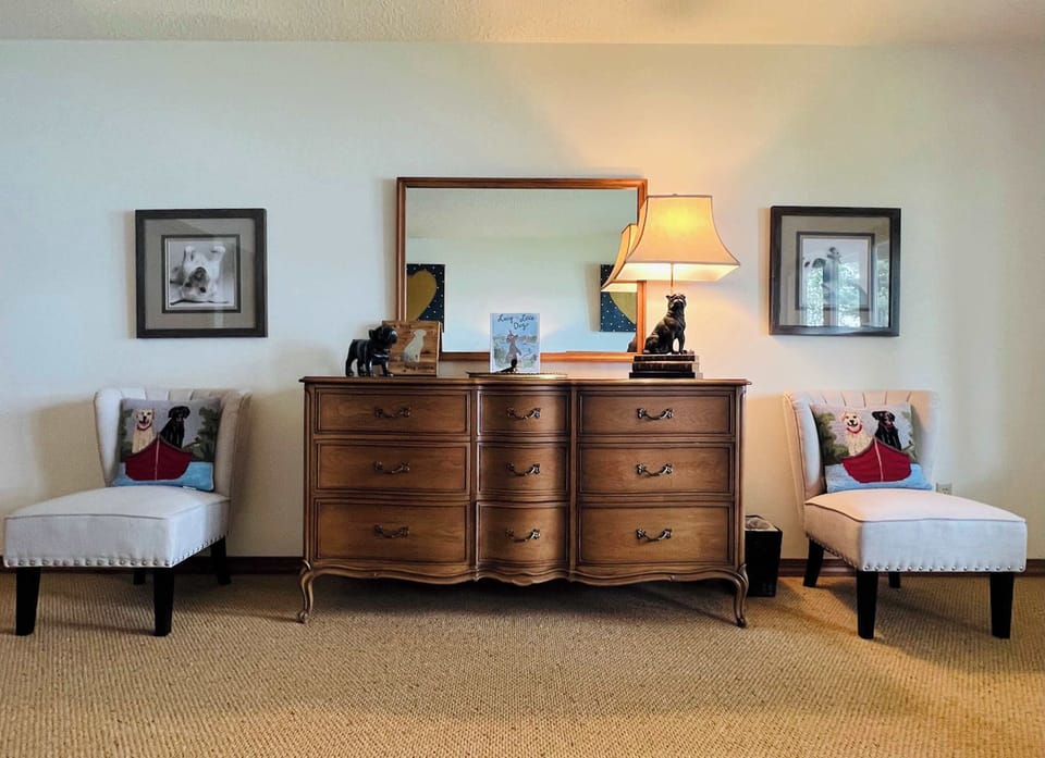 Downstairs bedroom with two full beds and lake views
