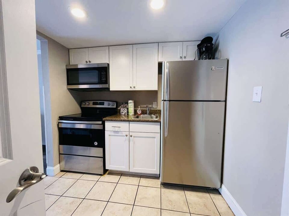 Fully stocked kitchen with everything you need for home-cooked meals by the beach.

