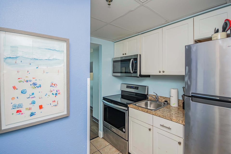 Whip up breakfast with ease in this bright and modern Myrtle Beach kitchen