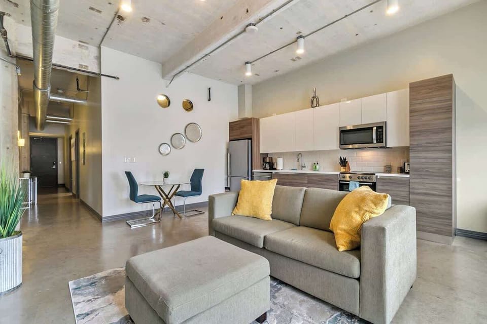Chic urban retreat with sleek furnishings and vibrant accents for relaxation!