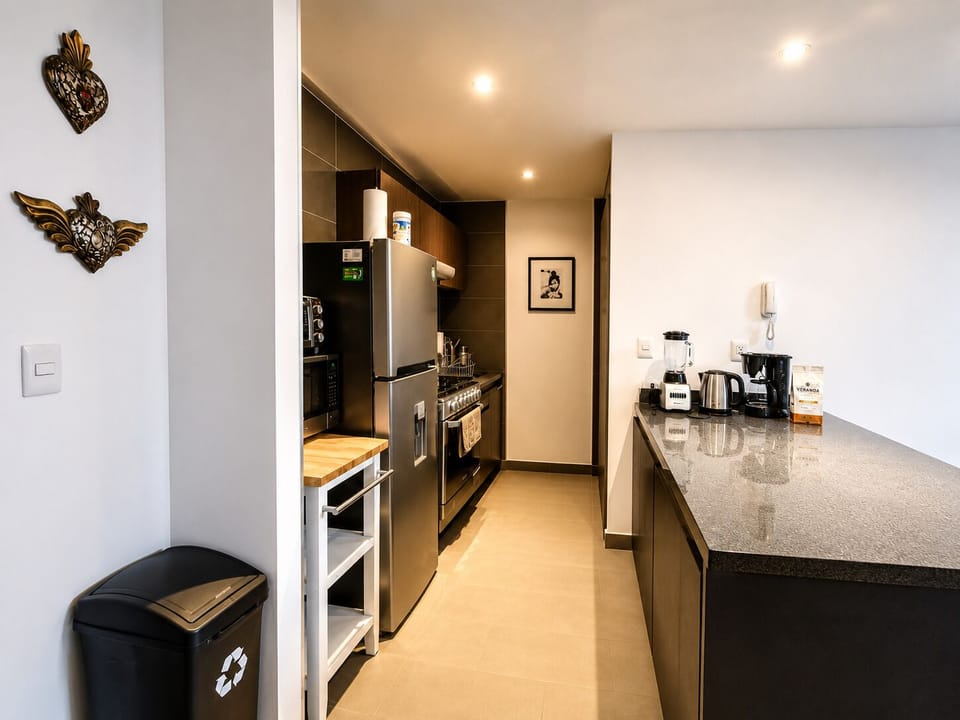 Fully equipped kitchen with all the essentials for a convenient and enjoyable cooking experience.
