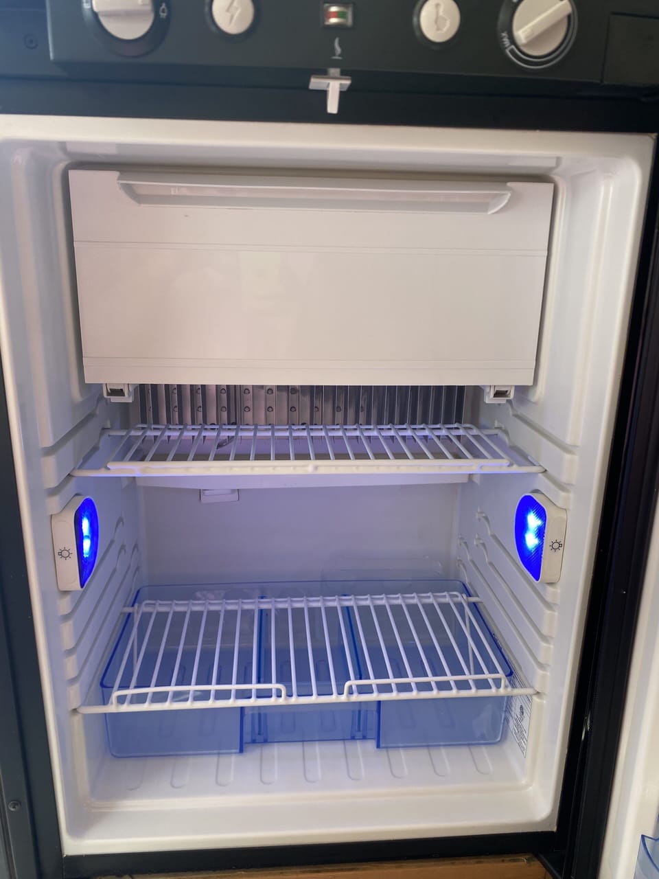 Larger dorm sized refrigerator. 