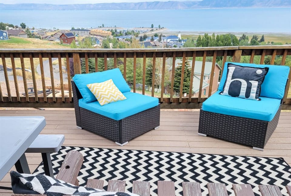 Cozy deck seating with lake views—perfect for morning coffee or evening sunsets.