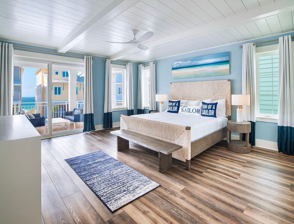 Enjoy the gulf breeze and views from the Primary Bedroom’s private balcony.